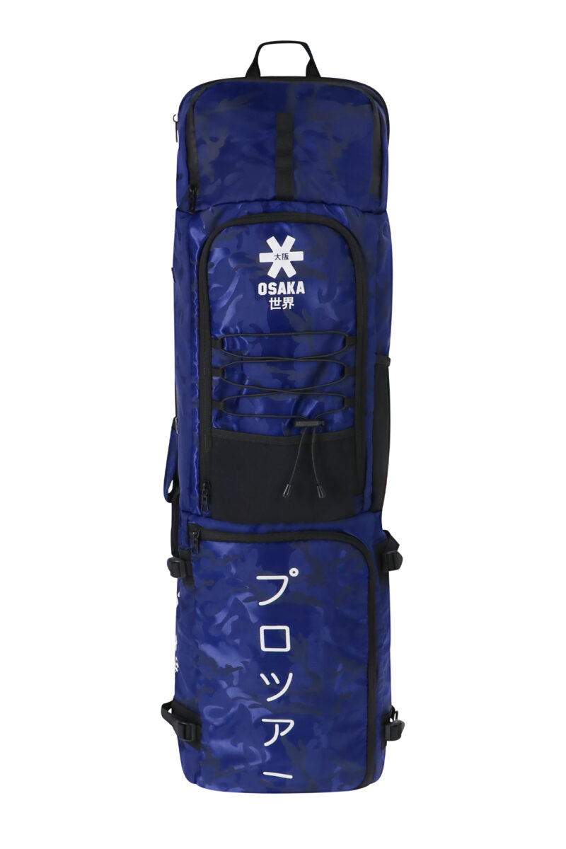 The Osaka Pro Tour Stickbag XL is the most complete stickbag available and maximizes storage space. Designed for professional athletes, this thoughtfully designed bag fits up to 6 field hockey sticks, allowing you to transport all your gear in ease and comfort. 67 Liter (102cm x 28cm x 23,5cm) Capacity: 6 sticks Dual Backpack straps for easy carrying side and frontal mesh pocket Frontal elastic straps for stowing shin guards water resistant top zipper (valuables pocket) Camouflage nylon jacquard fabric 1680D Ballistic Weave Polyester bottom panel
