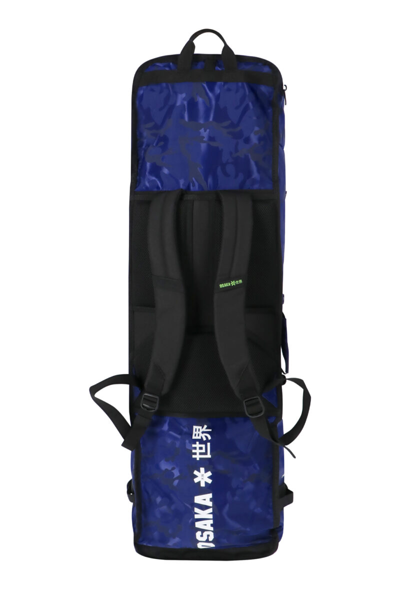 The Osaka Pro Tour Stickbag XL is the most complete stickbag available and maximizes storage space. Designed for professional athletes, this thoughtfully designed bag fits up to 6 field hockey sticks, allowing you to transport all your gear in ease and comfort. 67 Liter (102cm x 28cm x 23,5cm) Capacity: 6 sticks Dual Backpack straps for easy carrying side and frontal mesh pocket Frontal elastic straps for stowing shin guards water resistant top zipper (valuables pocket) Camouflage nylon jacquard fabric 1680D Ballistic Weave Polyester bottom panel
